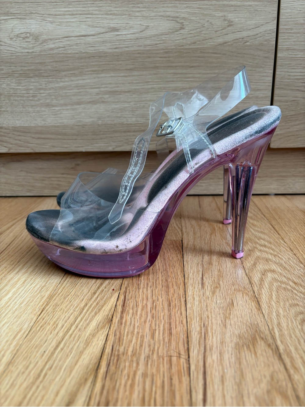 Well worn exotic dance shoe.